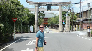 Neil at the torii gate to Yasaka shrine