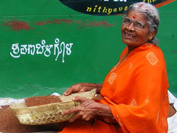 Woman doing something to do with making roti