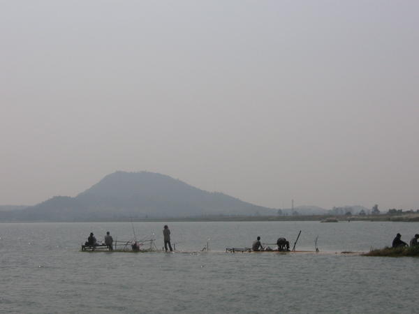 fishermen on the reservoir