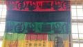 Garveyite flag decorated with inspiring quotes and Ghanaian symbols