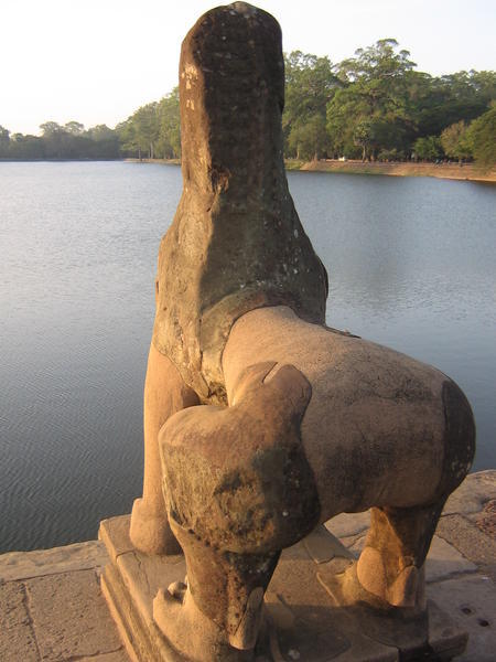 A guardian over the moat of Angkor Wat