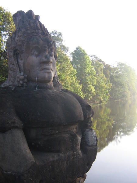 A Devi guarding the moat of Angkor Thom