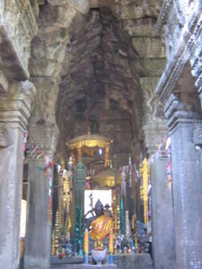 A modern Buddhist shrine within Banteay Kdei
