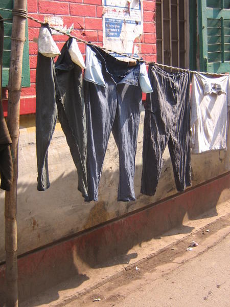 Clothes drying on a line in Sudder Street