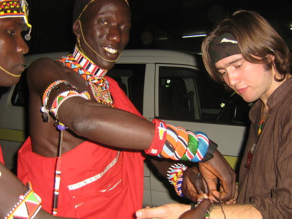 Recieving a gift from the Masai dudes on my first day in Kenya
