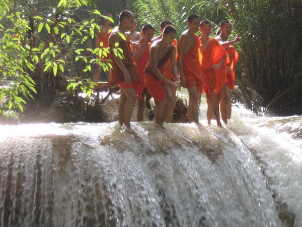 monks jumping off the falls