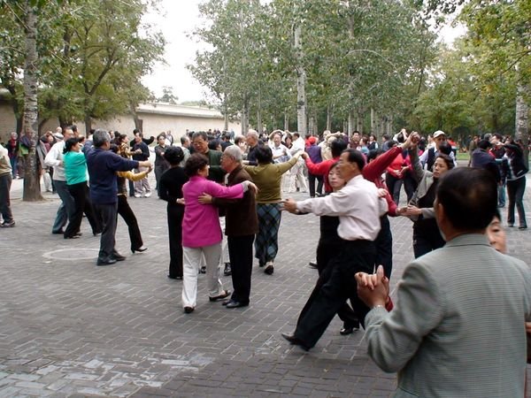 People dancing at the Temple of Heaven
