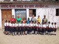 The children on their first day of school wearing their new shoes and custom made uniforms, and backpacks. 