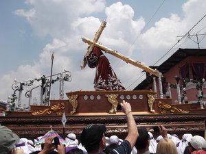 A Procession: Jesus carrying the cross.