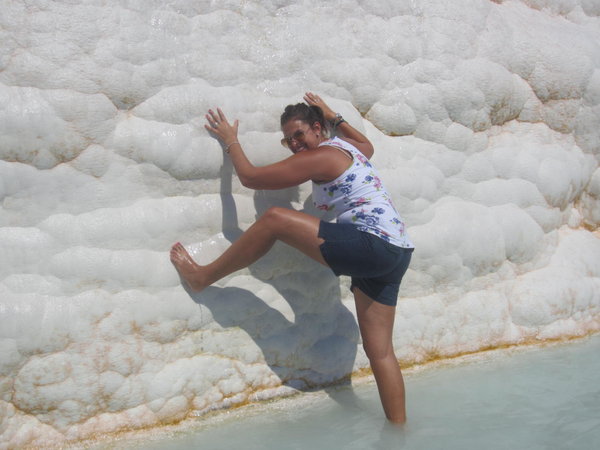 Imitating the many tourists doing sexy poses while in their bathing suits at Pamukkale.