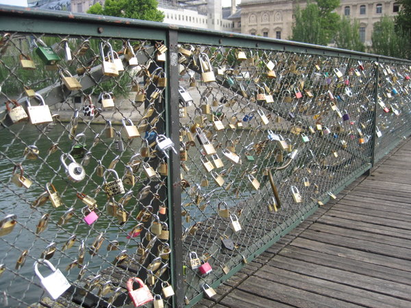 Love padlocks on a bridge between the Institute and the Louvre