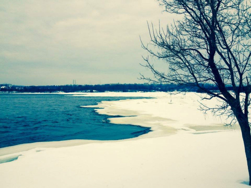 Snow creeps over the Ottawa River