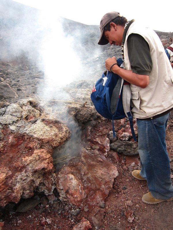 Making a fire in the volcanic vent