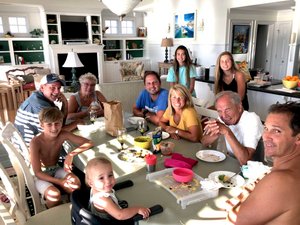 Family dinner at the beach house