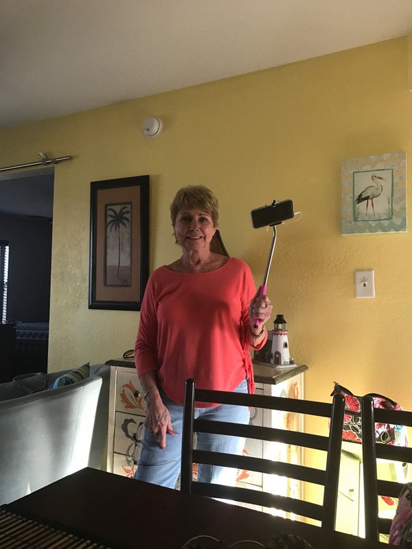 Judy trying to set up the selfie stick