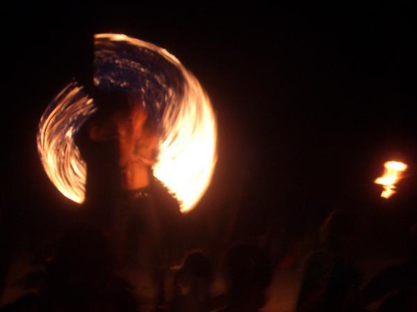 Flame jugglers at full moon