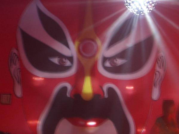 Face on a nighclub wall which isn'y good once you've had a few! (Chinese opera face)