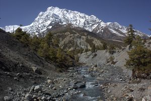 The mighty Annapurna III and a river