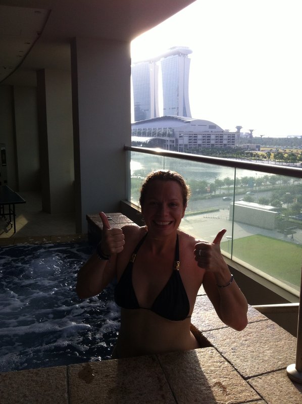 Jacuzzi at Sue Macs place with view of marina bay sands