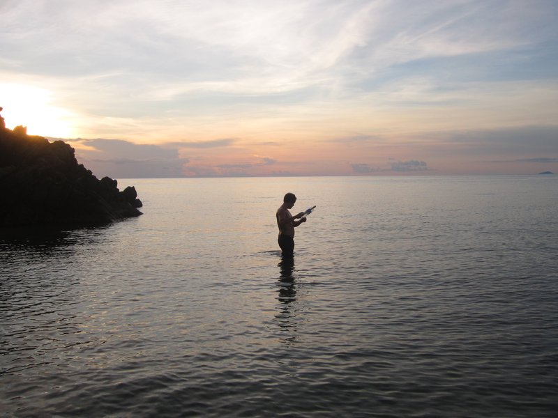 Fishing with a bottle in Koh Phangan