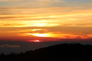 Bromo - sun begins to peak above the horizon