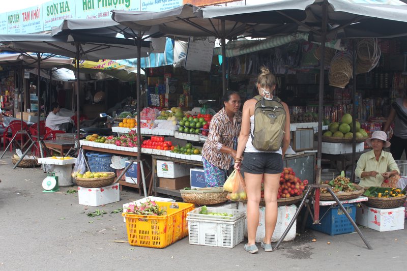 Becs bartering for fruit in the market
