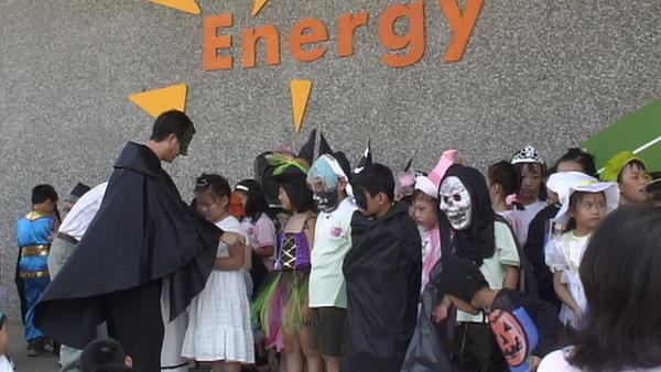 Principal and Trick Or Treat  students