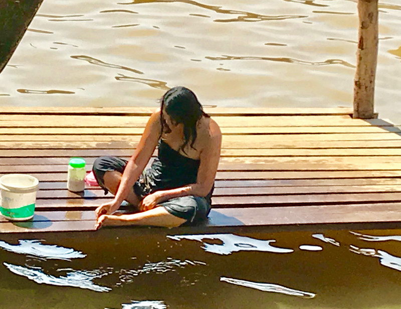 Woman bathing, Inle Lake