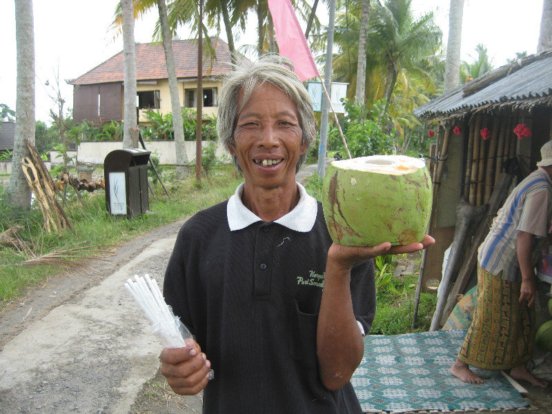 Farmer selling me a fresh coconut
