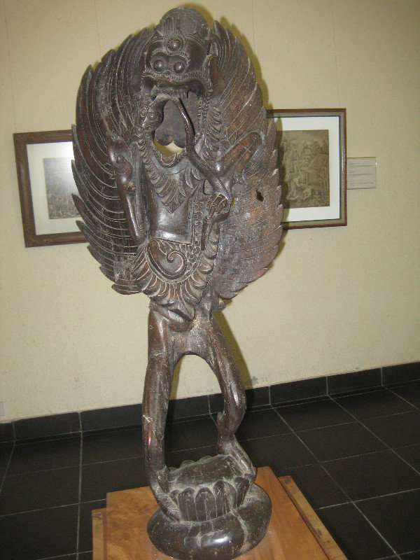 Garuda eating a snake; Akar wood