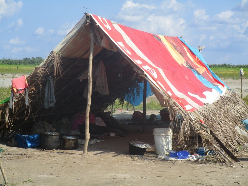 Farmer living on the beach during dry season