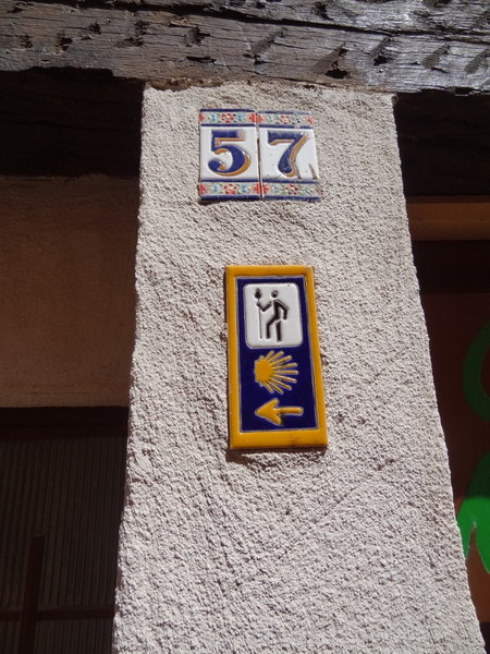 all the house numbers are in tiles...this one has a arrow for us