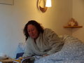 Jacqui keeping warm in the one robe in the room