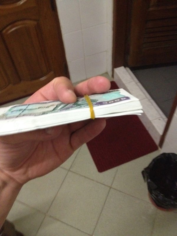 $100 USD in Kyat
