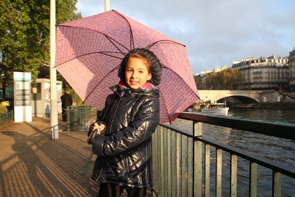 A rainy day in Paris - Emily shows off her new Beret