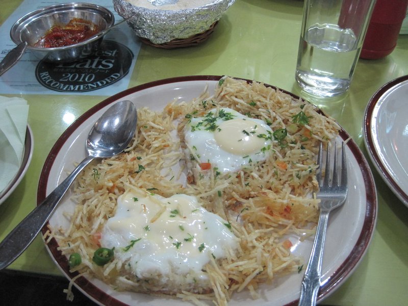 Parsi food!  This is called Sali par eeda (eggs served on matchstick potatoes)