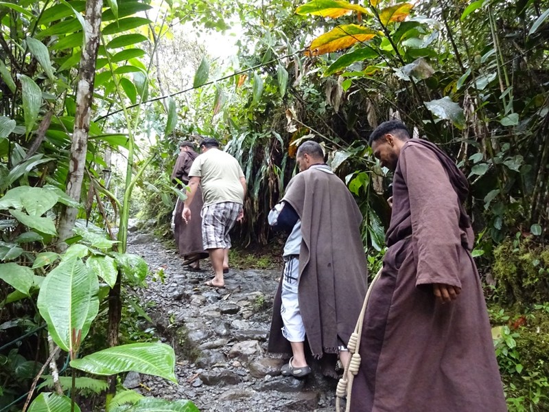 monks on a trail
