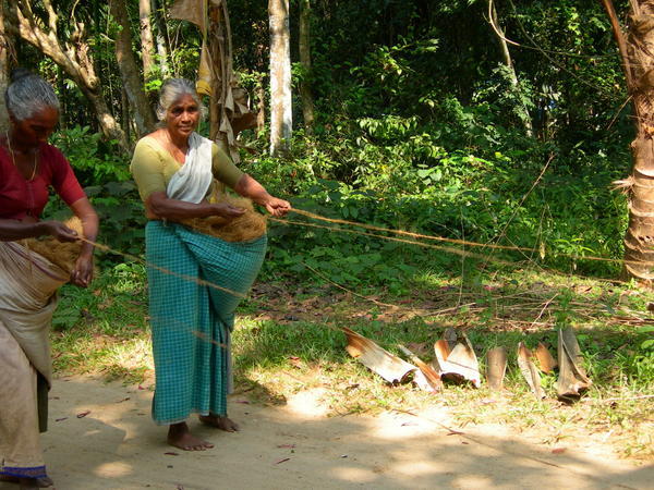 women making twine in a village on the backwaters of kochi