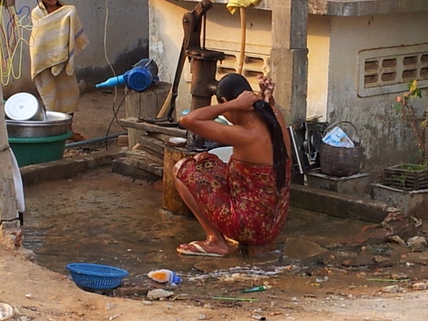taking bath and washing right on street