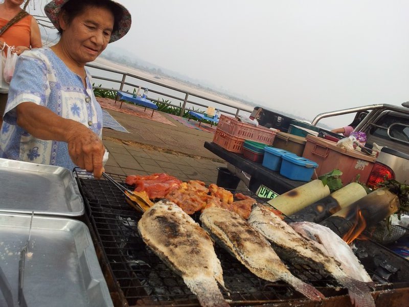 eating fish at the Mekong