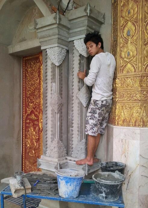 craftsman working on temple