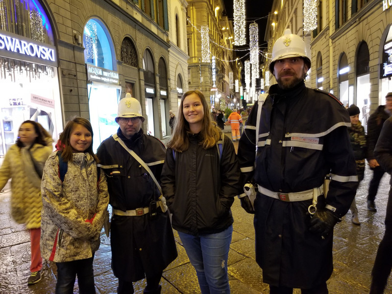 Kasie and Sriacha pose with "the guys with the cool hats" in Firenze