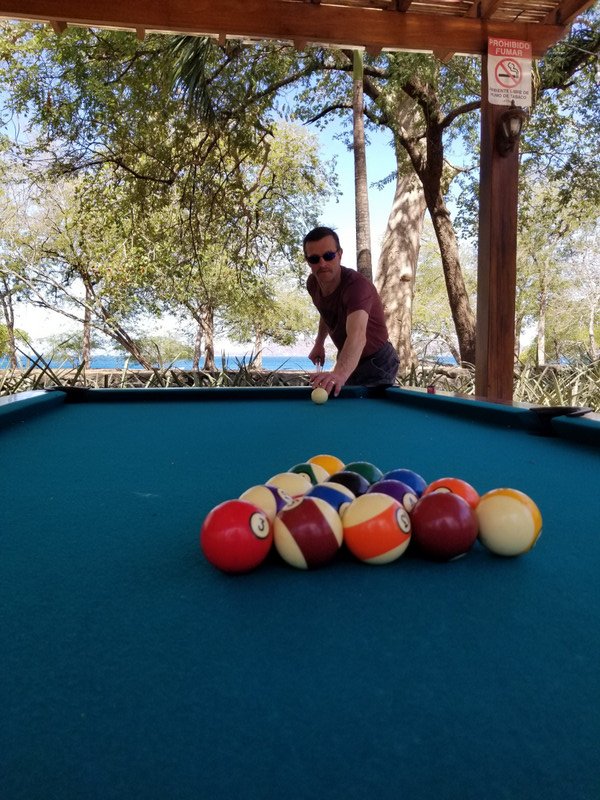 Pedro playing pool at Casa Conde 