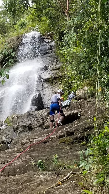 Pedro Rappelling Down the Falls