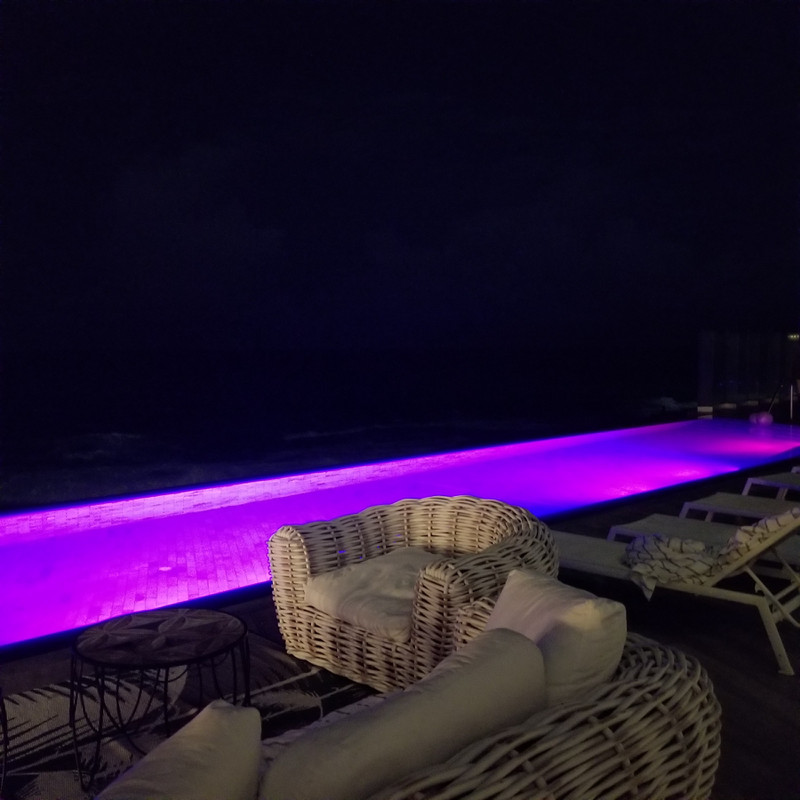 Infinity pool lit up at night