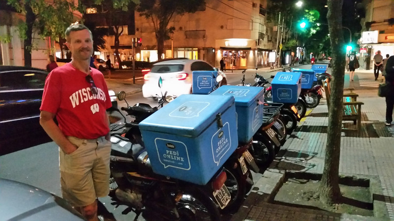 Pedro admires the ice cream delivery scooters 