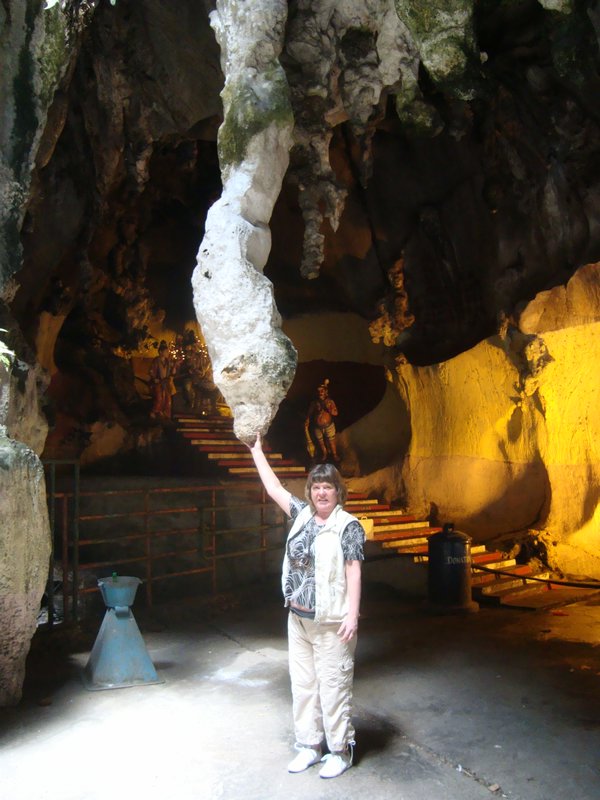 M with a large Stalagtite - Batu Caves