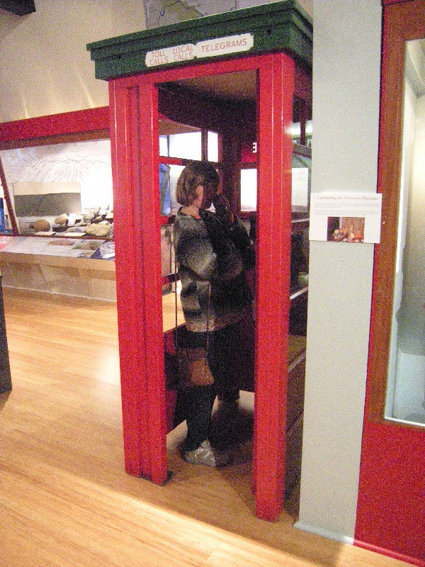 14. M in an old Phone Box Oamaru Museum