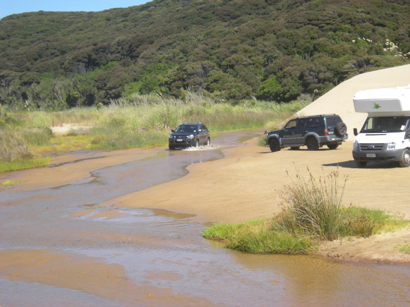 70. Car Emerging from 90 Mile Beach
