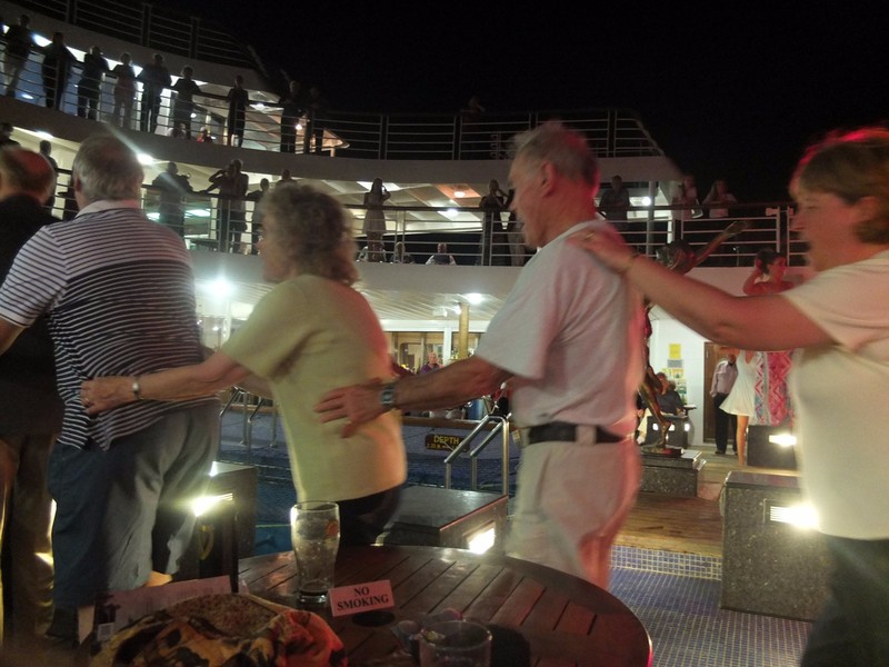 Pam and Stewart Doing the Conga Deck Party